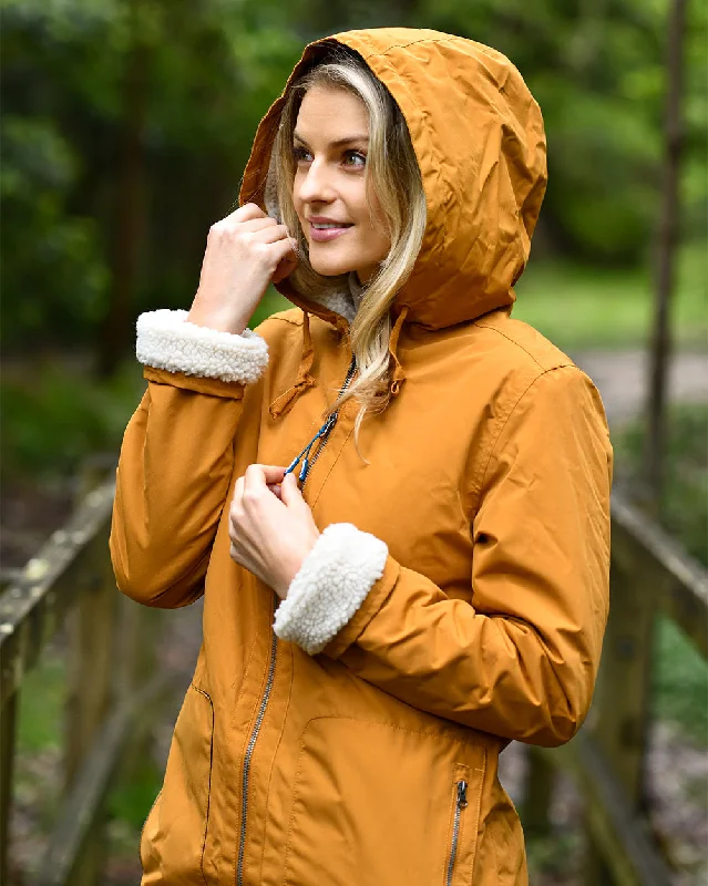 Women's cropped leather jackets with a fringe detail for a western - inspired outfitHestia Coat in Caramel Women's cropped leather jackets with a fringe detail for a western - inspired outfitHestia Coat in Caramel