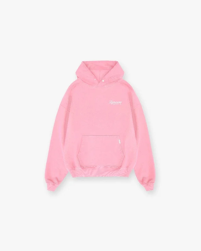 Women's hoodie with a kangaroo pocket and a pom - pom drawstring for added charmRepresent Owners Club Script Hoodie - Pink
