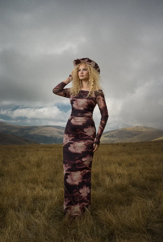 Maxi dresses with a criss - cross back for a flirty and unique detailMadden Girl Patterned Mesh Maxi Dress