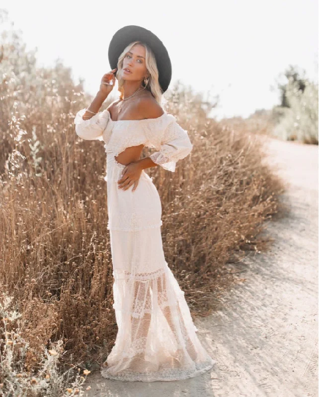 Maxi dresses with a pleated skirt for a timeless and elegant appearanceKittenAlarm - Seychelles Smocked Tiered Maxi Dress - Cream