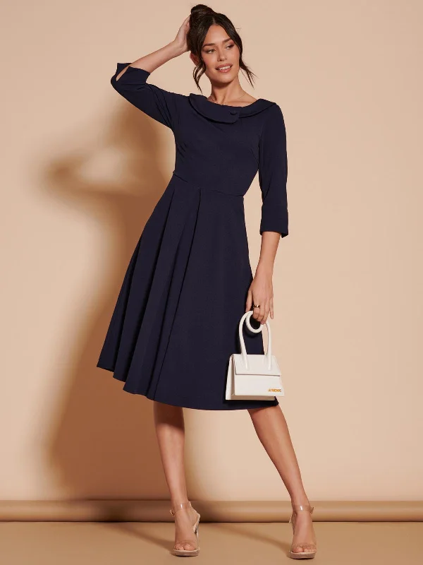 Velvet midi dresses in jewel tones for a glamorous winter event3/4 Sleeve Fold Neck Midi Dress, Navy Velvet midi dresses in jewel tones for a glamorous winter event3/4 Sleeve Fold Neck Midi Dress, Navy