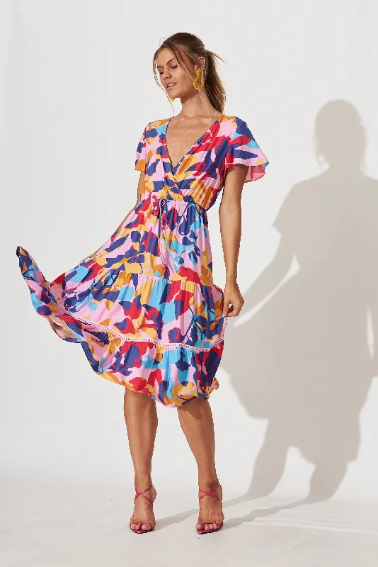 Midi dresses with V - necklines for a flattering and elongating effectAquarius Midi Dress In Bright Multi Leaf Print Midi dresses with V - necklines for a flattering and elongating effectAquarius Midi Dress In Bright Multi Leaf Print