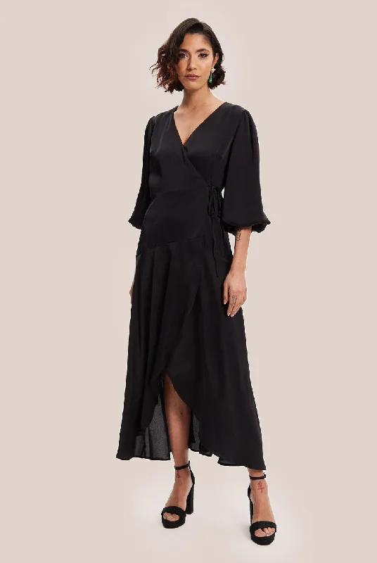 Midi dresses with ribbed textures for a unique and tactile appearanceLiquorish Black Midi Wrap Dress With Short Puff Sleeves Midi dresses with ribbed textures for a unique and tactile appearanceLiquorish Black Midi Wrap Dress With Short Puff Sleeves