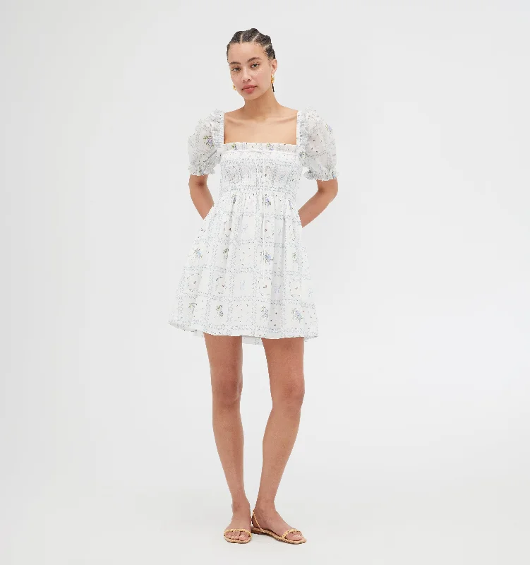 Velvet midi dresses in jewel tones for a glamorous winter eventThe Scarlett Mini Nap Dress - White Floral Patchwork Velvet midi dresses in jewel tones for a glamorous winter eventThe Scarlett Mini Nap Dress - White Floral Patchwork