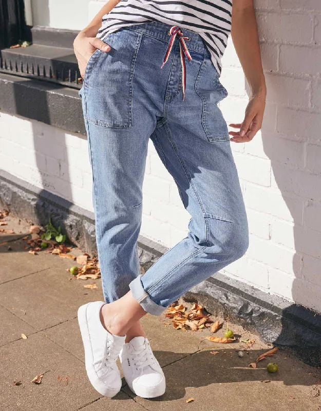 Men's Denim Button - Down Shirt with Roll - Up Cuffs for a Relaxed Summer VibeCara Raw Hem Denim Jogger - Mid Wash Men's Denim Button - Down Shirt with Roll - Up Cuffs for a Relaxed Summer VibeCara Raw Hem Denim Jogger - Mid Wash