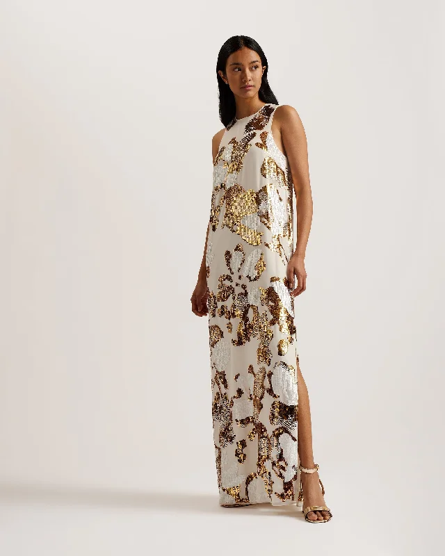 Maxi dresses with tassel accents for a fun and lively touchDanusia Sequin Racer Maxi Dress Ivory Maxi dresses with tassel accents for a fun and lively touchDanusia Sequin Racer Maxi Dress Ivory