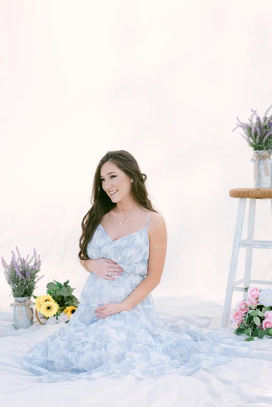 Maxi dresses with ribbed textures for a unique and tactile lookWhite & Blue Floral Tiered Maxi Dress