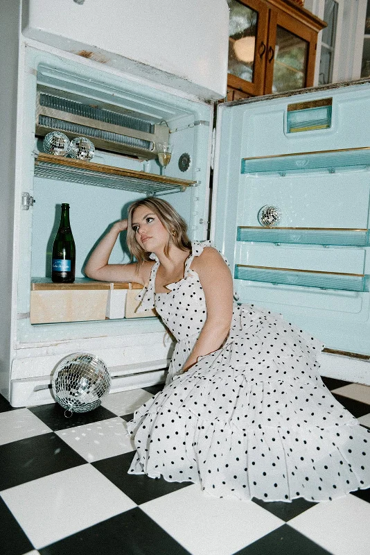 Maxi dresses with bow accents at the waist for a sweet appearanceWhite Polka Dot Ruffle Maxi Dress