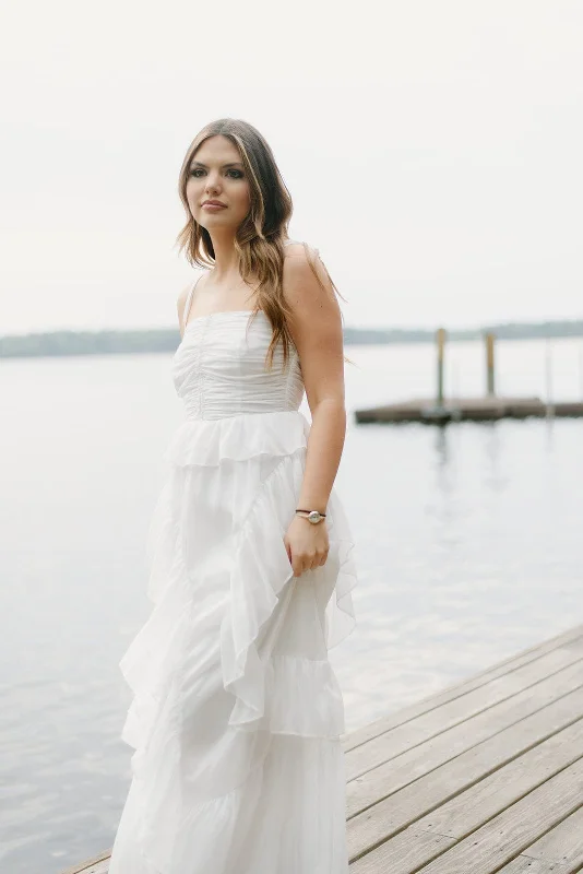 Maxi dresses with tassel accents for a fun and lively touchWhite Shimmer Ruffled Maxi Dress