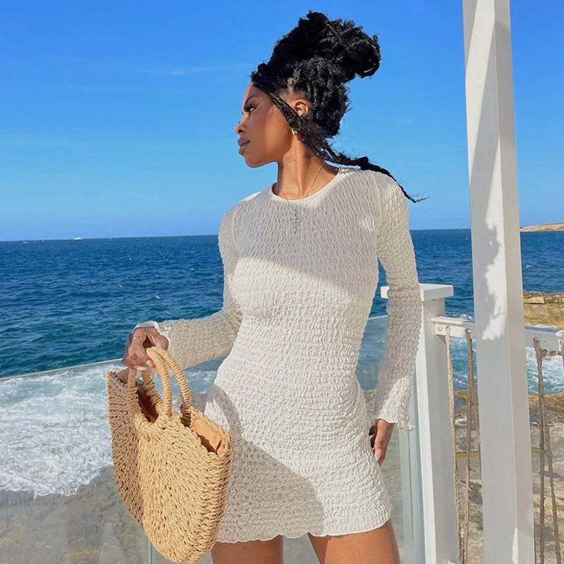 Mini dresses with gathered skirts for a voluminous effectBeach Vacation Smocked Crew Neck Long Sleeve Tie Back Mini Dress - White
